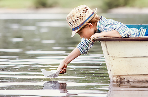 Pojke i båt